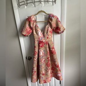 Floral tea length. Full front slit.